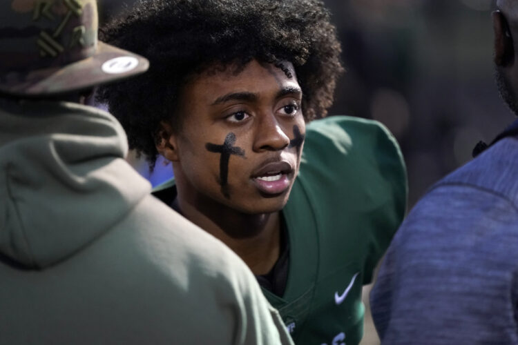 Prayers go on, sometimes out of sight, in prep football